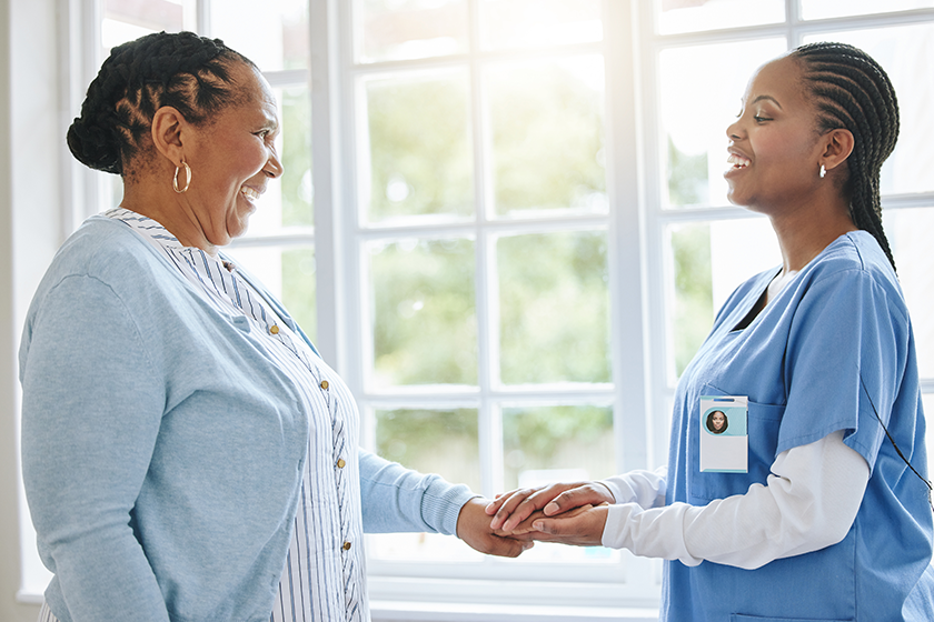 shot-nurse-speaking-her-female-patient